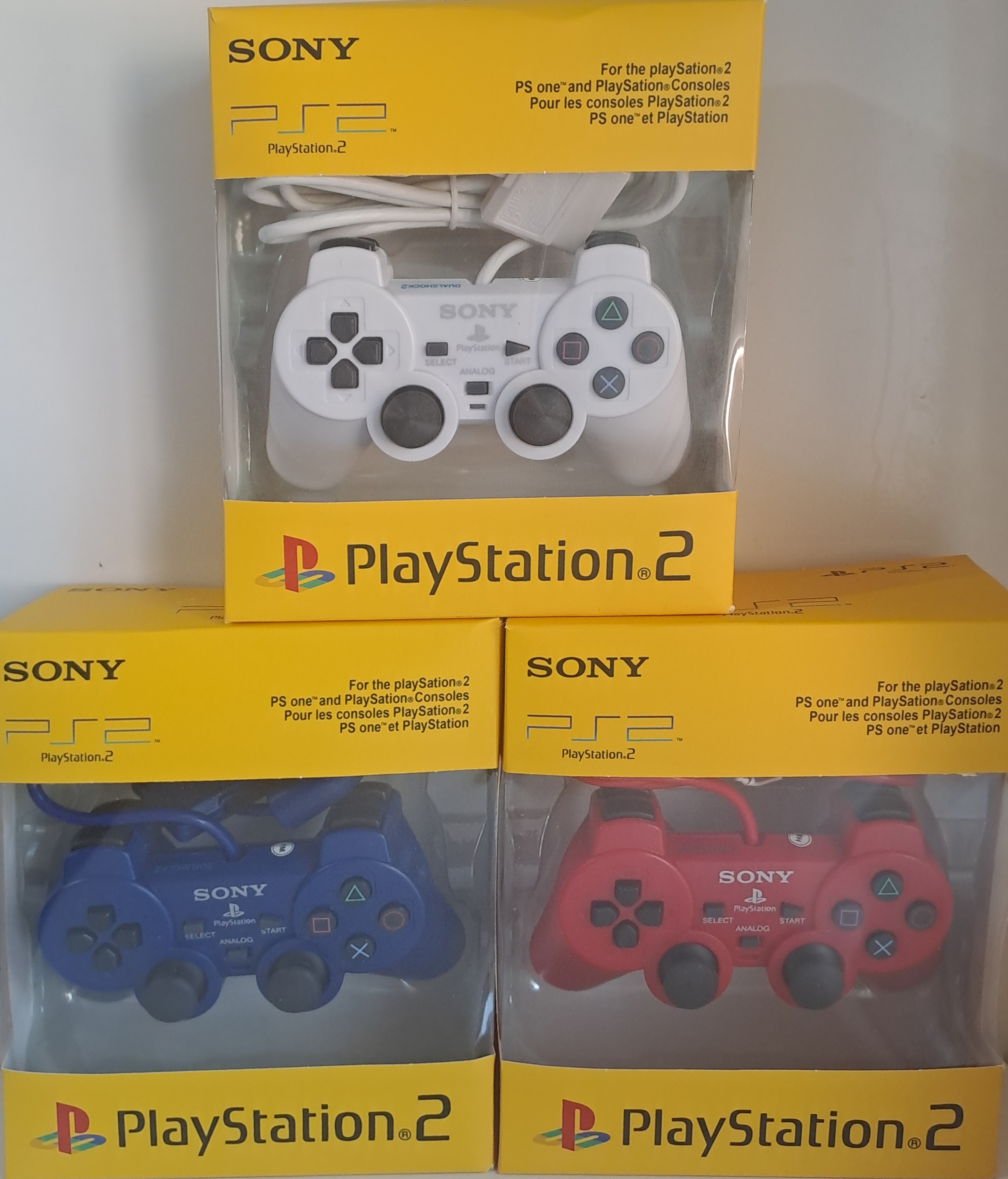 دسته بازی رنگی پلی استیشن 2 مدل Dualshock 2 سیم ابریشمی